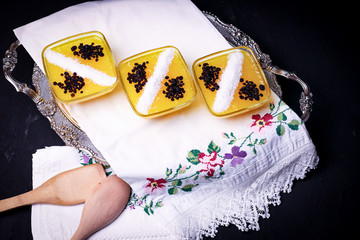 yellow pudding with coconut decoration