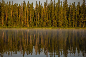 Fototapeta na wymiar Morning Meditation at a Mountain Lake