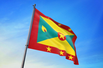 Grenada flag waving on the blue sky 3D illustration