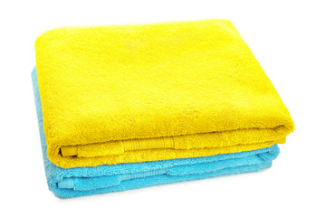 Clean soft towels on white background