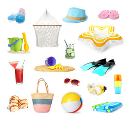 Set of different beach accessories on white background
