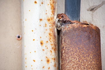A piece of rusty broken pipe
