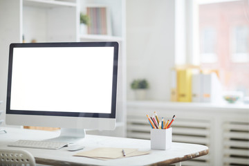 Background image of business workplace in modern office focus on blank computer screen with write background, copy space