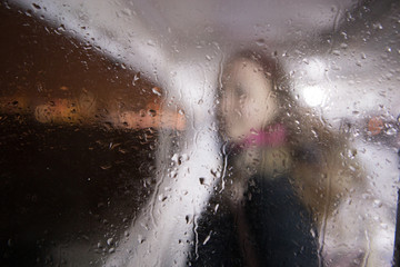 rain drops portrait on window