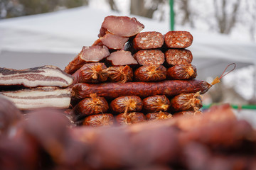 Selling Various Smoked Meat at Street Market