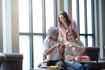 Happy family give gifts to each other on important occasions and photographed.