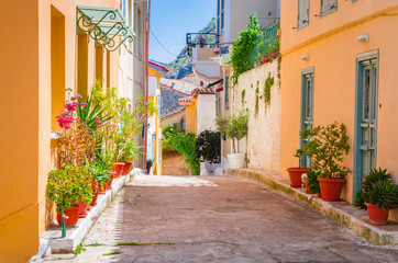 Fototapeta na wymiar Traditional cozy greek street in city Nafplio, Greece