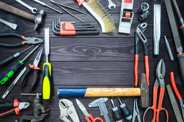 Background from various tools on wooden workbench. top view.copy space