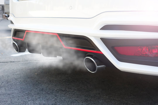 Air Pollution Particulate Matter Of 2.5 Microns Or Less In Diameter (PM 2.5)  From  Exhaust White Car