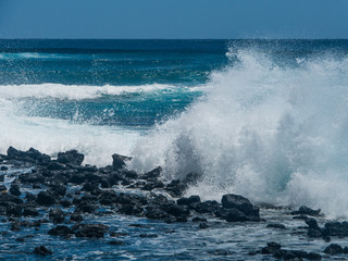 waves crashing on rocks