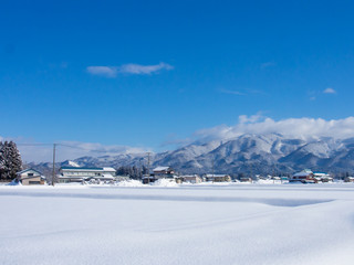 Fototapeta na wymiar 秋田県　大仙市　冬　雪　景色　日本の風景　青空