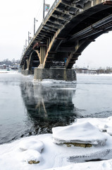 The old bridge over the Angara in the fog