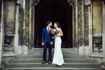 Newly wed couple on the church steps