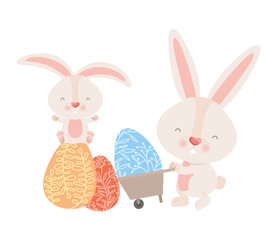 bunnies with wheelbarrow and easter eggs icon