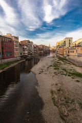 Fototapeta premium Girona skyline over a wide river with famous landmark cityscape in Catalonia