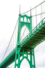 Famous popular gothic St Johns bridge over the Willamette River in Portlan industrial area