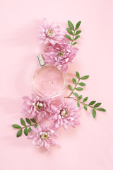 Woman perfume among flowers