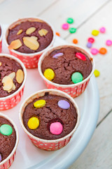 Brownie cupcakes or chocolate cupcakes.