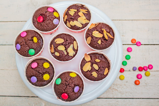 Brownie cupcakes or chocolate cupcakes.