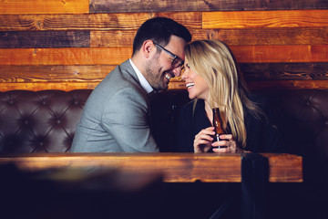 Friends in the Pub. Drinking beer, talking, having fun. 