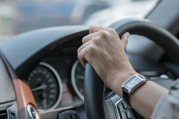 A women driving a car.
