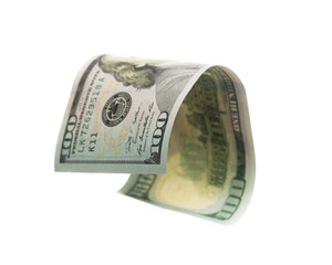  flying banknote of hundred dollars isolated on white.