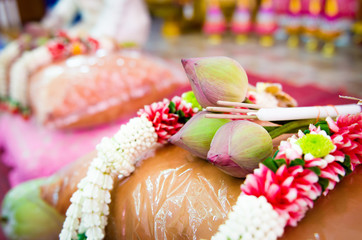 Lotus, incense and garland used in ordination in Buddhism.