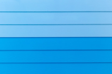 Wood blue background.blue Synthetic wood wall texture use for background.Colorful wooden board...