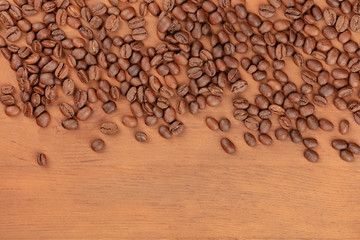 An overhead photo of coffee beans with copy space, an abstract coffee background