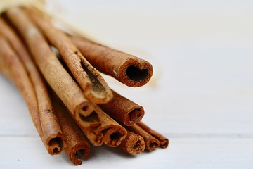 cinnamon sticks on white background