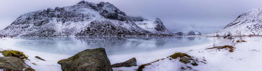 frozen lake in the mountains, Lofoten, Norway