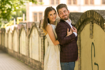 Beautiful engagement couple posing outdoor