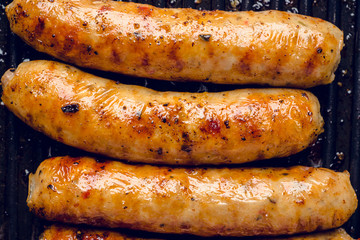 Grilled sausages in a pan. Selective focus. Shallow depth of field.