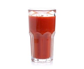A glass of tomato juice on a white background. Isolation