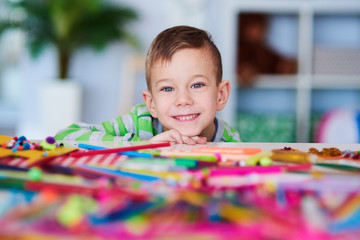 Portrait of happy preschooler with big smile on his face