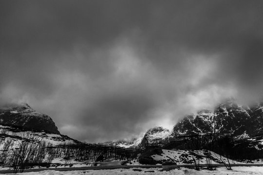 clouds over the mountains in black and white, Lofoten, Norway © oren