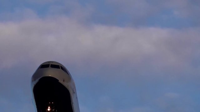 A plane comes in to land at Heathrow airport