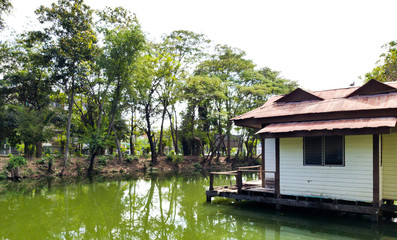 Obraz premium wooden house along the lush Ada Bojana riverside, Thailand