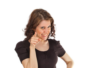 Fototapeta premium Young charming curly woman laughing at someone and points a finger at him