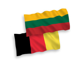 National vector fabric wave flags of Lithuania and Belgium isolated on white background. 1 to 2 proportion.