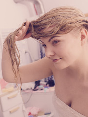 Naklejka premium Woman with wet blonde hair