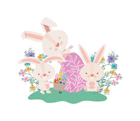 Obraz na płótnie Canvas rabbits with wheelbarrow and easter eggs icon