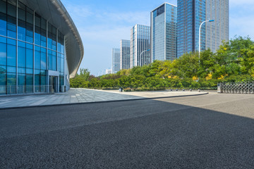 Fototapeta premium Empty Road with modern business office building