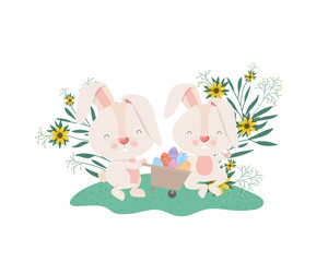 rabbits with wheelbarrow and easter eggs icon