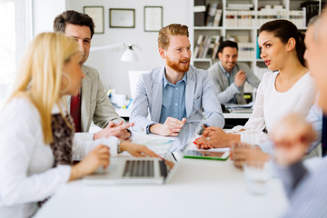 Group of business people working as team in office