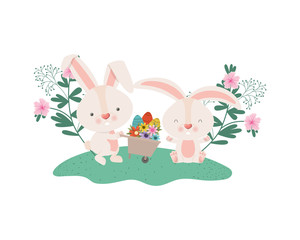 rabbits with wheelbarrow and easter eggs icon