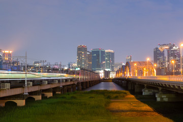 Landscape of osaka city at Umeda from across the Yodogawa River.