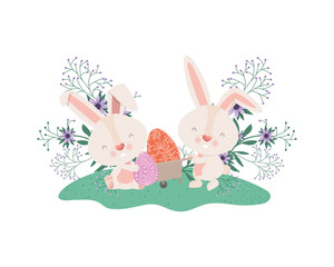 rabbits with wheelbarrow and easter eggs icon
