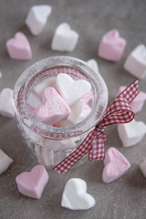Marshmallows hearts white and pink color on gray background.  Valentine's day. Love
