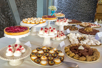 Delicious wedding reception candy bar dessert table